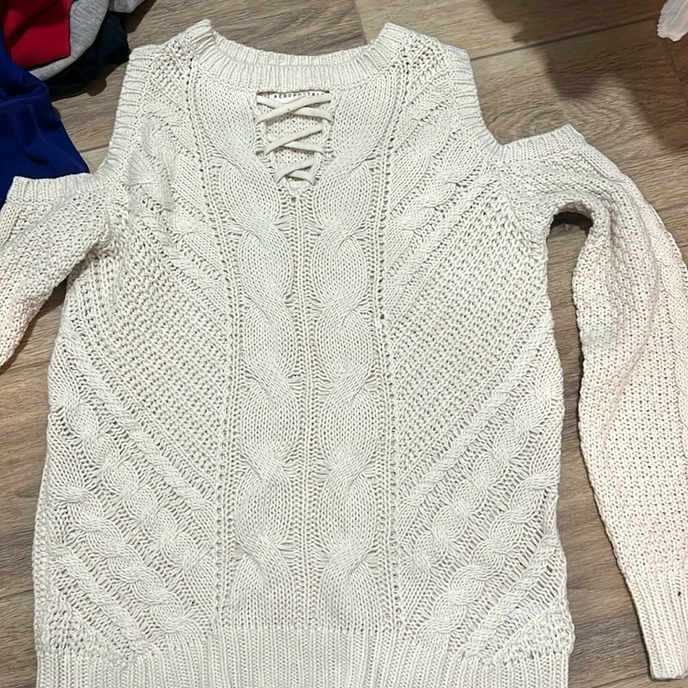 off-white knit sweater crossing neckline pattern no shoulder long sleeve
